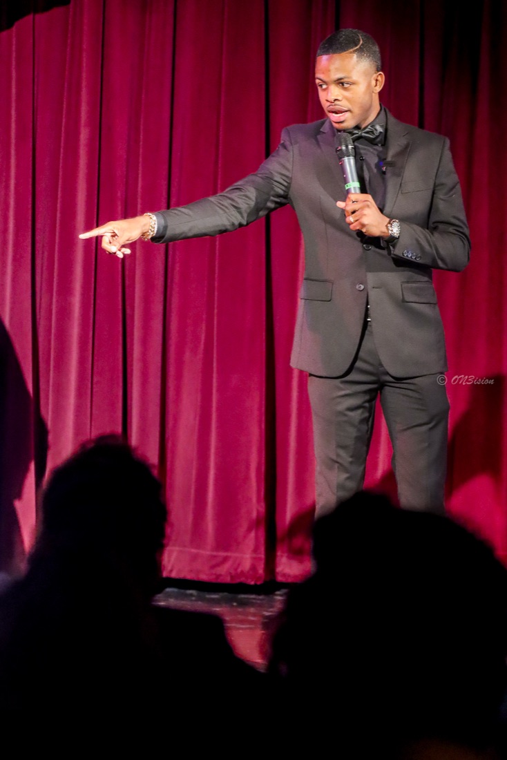 Brother Ben X speaking on stage